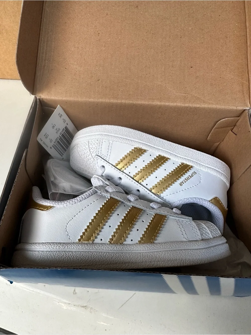 adidas Kids White Sneakers with Gold Stripes